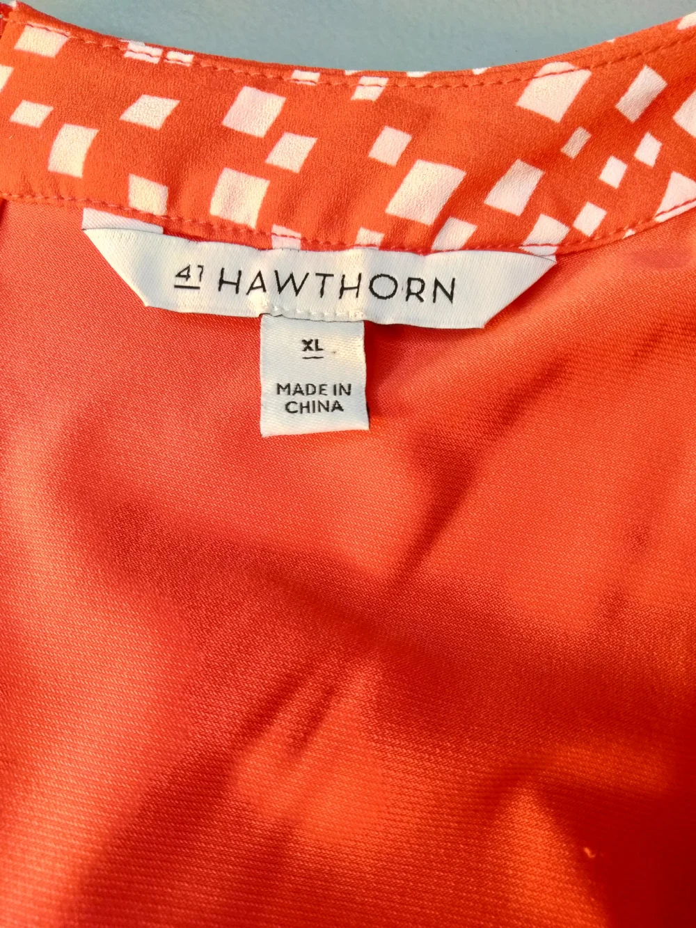 41 Hawthorn Orange/ White Print Sleeveless Twist-Front Top